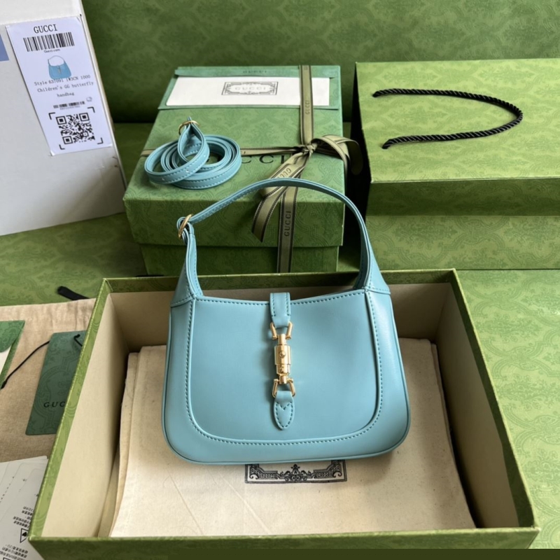 G*u*i top handle bags